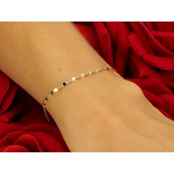 Delikatna złota bransoletka damska próby 585 złożona z drobnych blaszek. Długość 19 cm, waga 0,67 g, szerokość 1,7 mm, zapięcie na karabińczyk. 3na co dzień i na pr.jpg